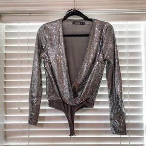 Sequin body suit size medium. Great condition; worn once.